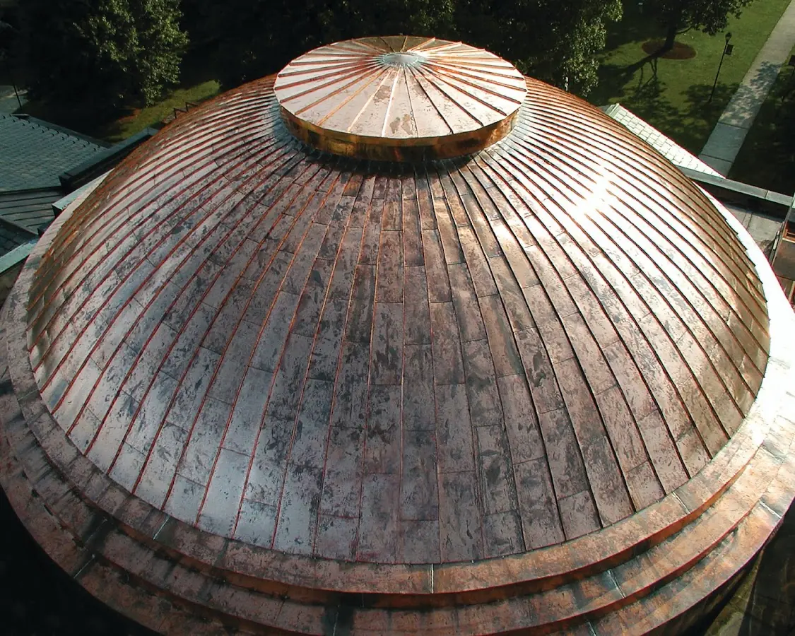 Craftsman Roofing crew installing a new roof in West Samoset